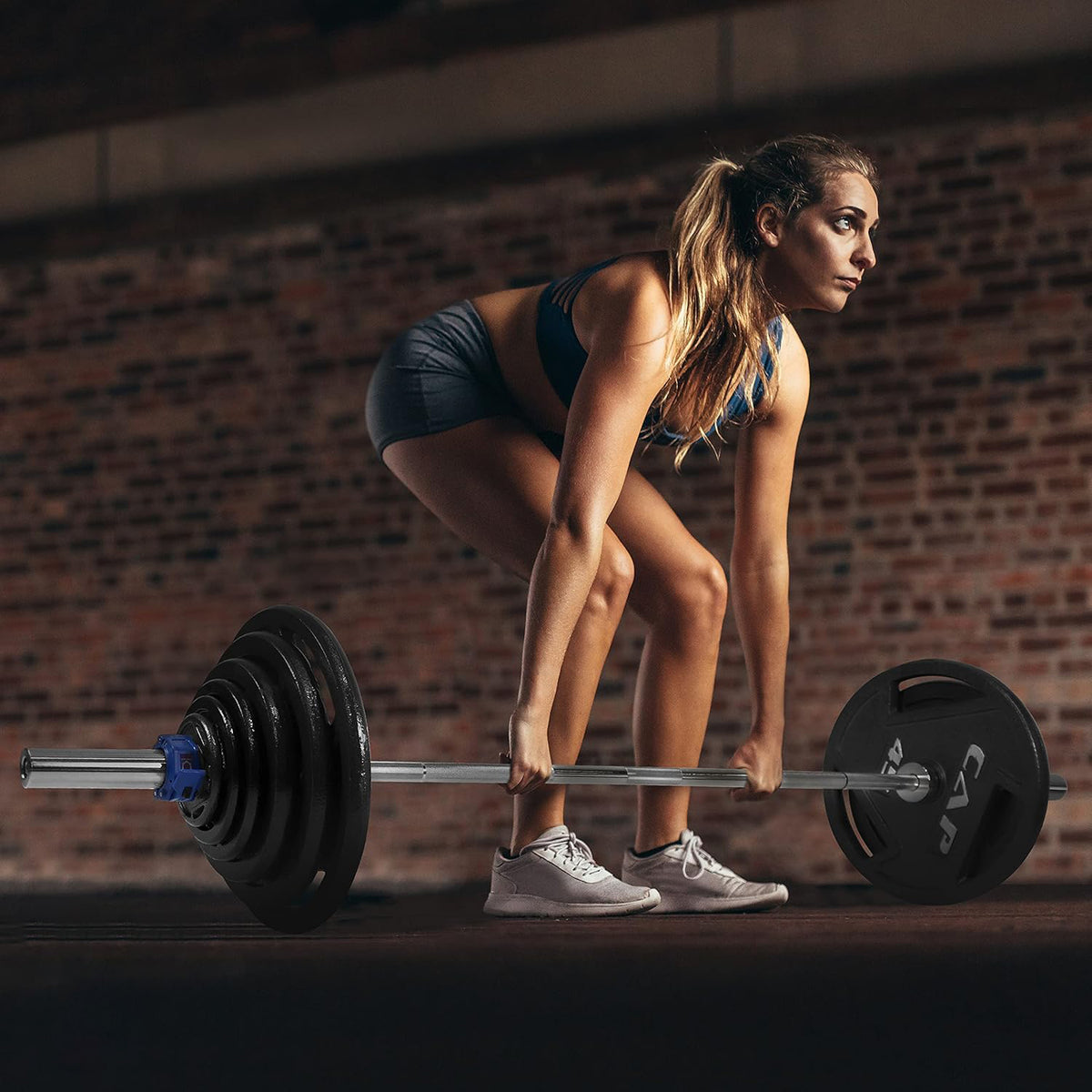 CAP Barbell Cast Iron 2-inch Olympic Grip Plates